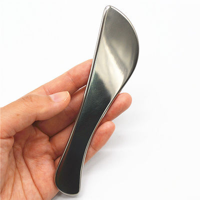 Améliorez votre routine de soins de la peau avec des outils de massage en métal argenté et en titane