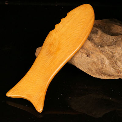 Tableau de Gua Sha en bois jaune pour la médecine traditionnelle chinoise