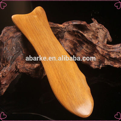 Tableau de Gua Sha en bois jaune pour la médecine traditionnelle chinoise