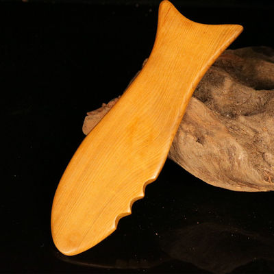 Tableau de Gua Sha en bois jaune pour la médecine traditionnelle chinoise