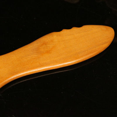 Tableau de Gua Sha en bois jaune pour la médecine traditionnelle chinoise