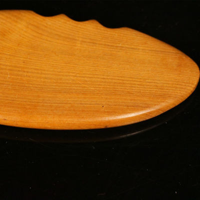 Tableau de Gua Sha en bois jaune pour la médecine traditionnelle chinoise