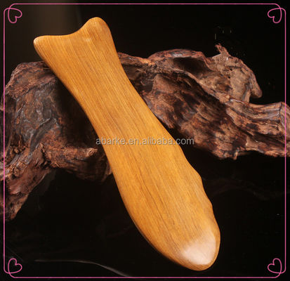 Outil en bois en forme de poisson en forme de gua sha parfait pour le massage et la désintoxication