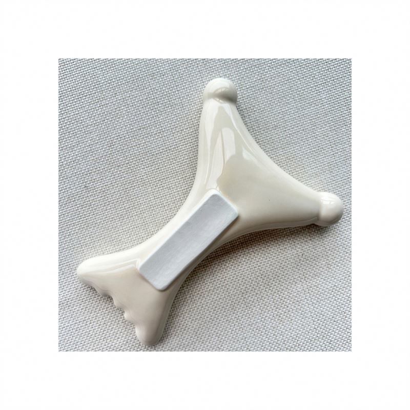 OEM/ODM Ceramique en forme de X Gua Sha Scraping Massageur Salon de beauté Essentiel pour la relaxation du visage