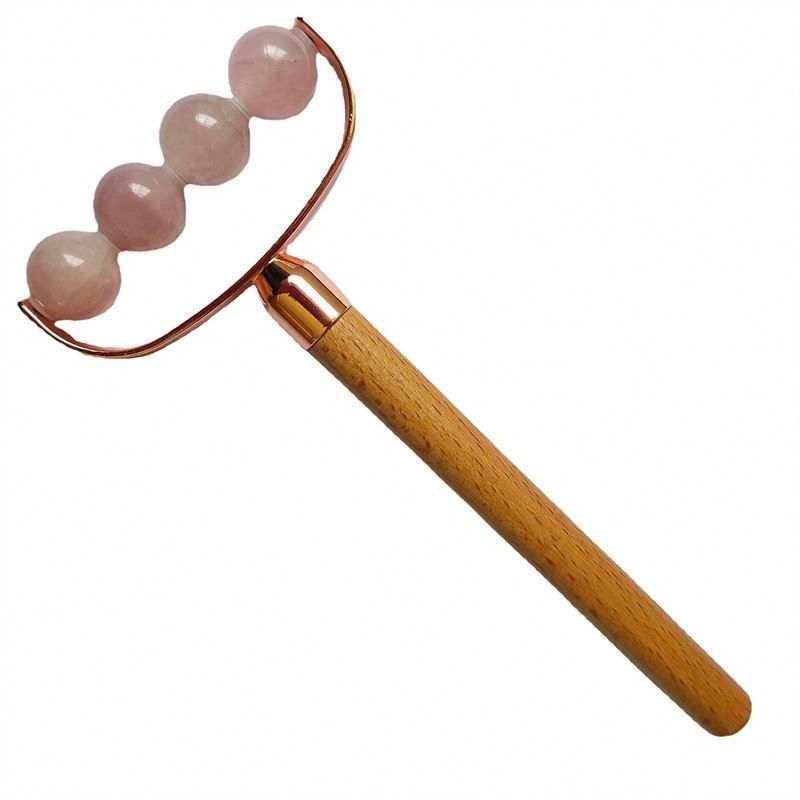 Masseur facial portable rose quartz à tête unique anti-rides rouleau de poignée en bois