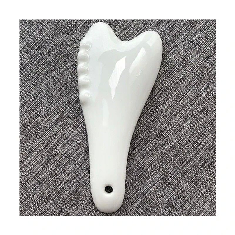 Outil de massage Gua Sha en céramique blanche pour l'acupression