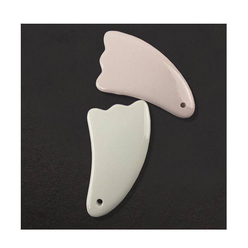 La planche de massage en céramique Guasha est le choix ultime pour les soins du visage et du corps.